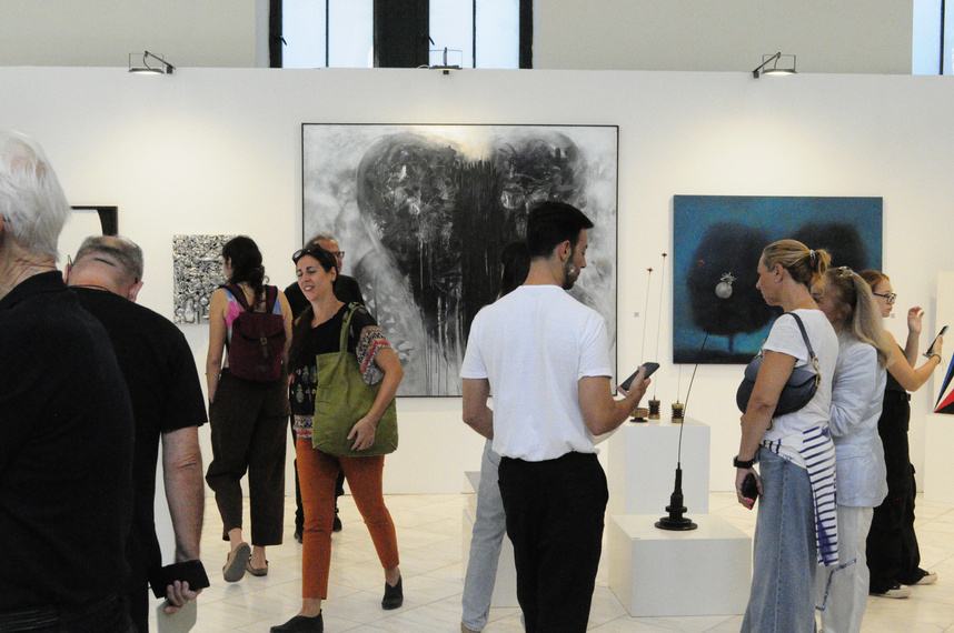 Visitors at the Roma Gallery booth, 2024