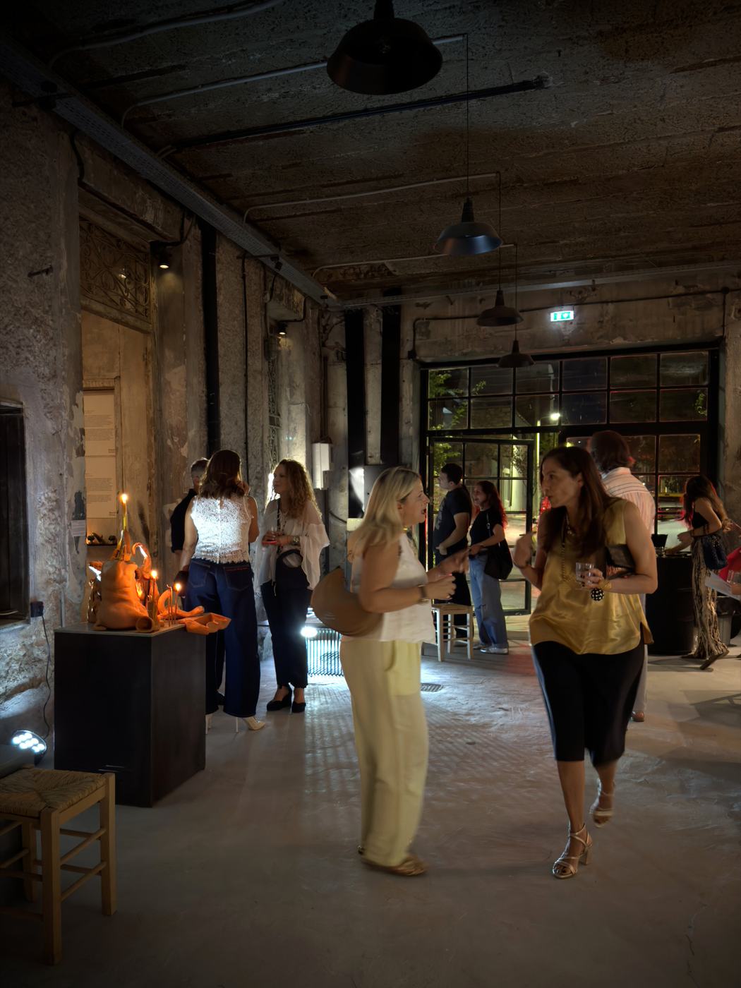 Visitors in the industrial hall, .sympan, 2026